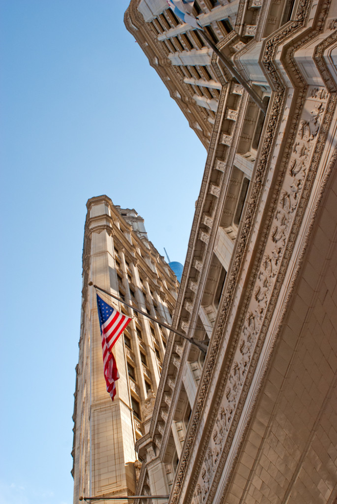 building detail and a flag in Chicago