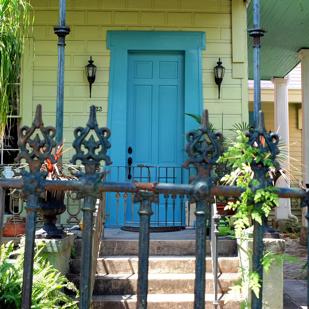 turquiose door of a house in Garden District